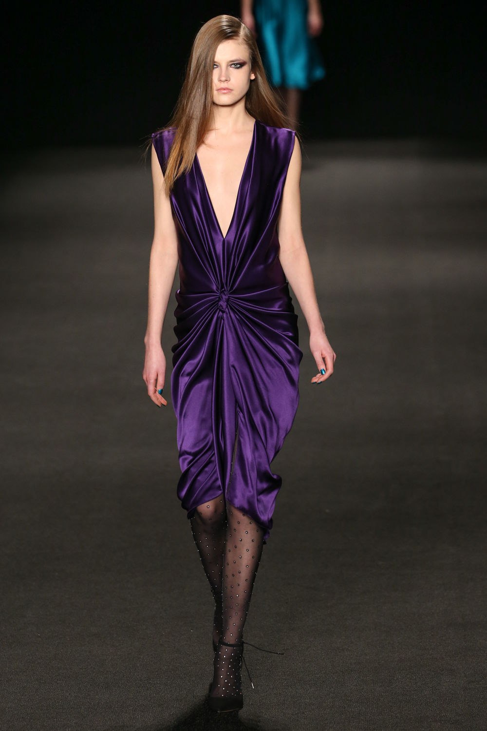 NEW YORK, NY - FEBRUARY 13: A model walks the runway at the Monique Lhuillier fashion show during MBFW Fall 2015 at Lincoln Center on February 13, 2015 in NYC